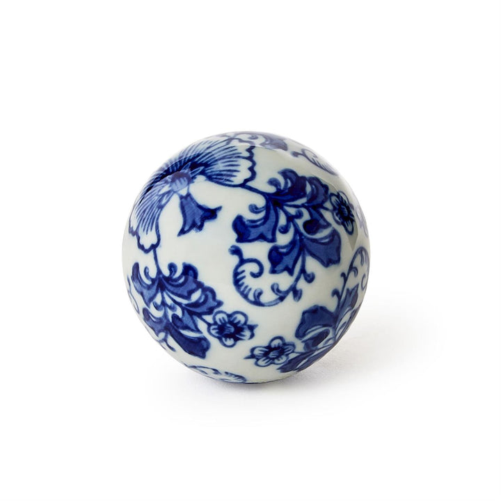 Blue floral pattern on a white ceramic ball