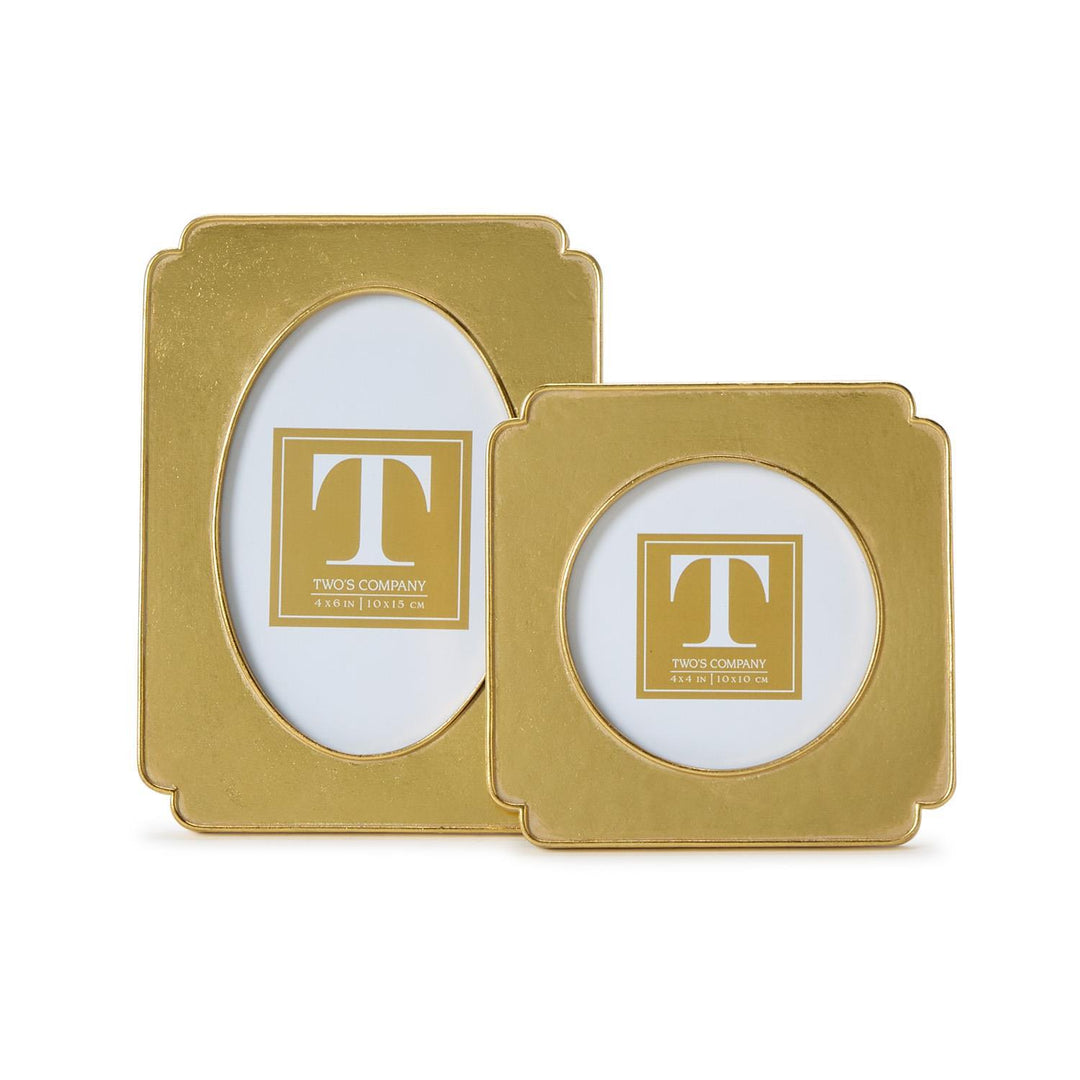 Two gold picture frames with a visible brand logo on a white background