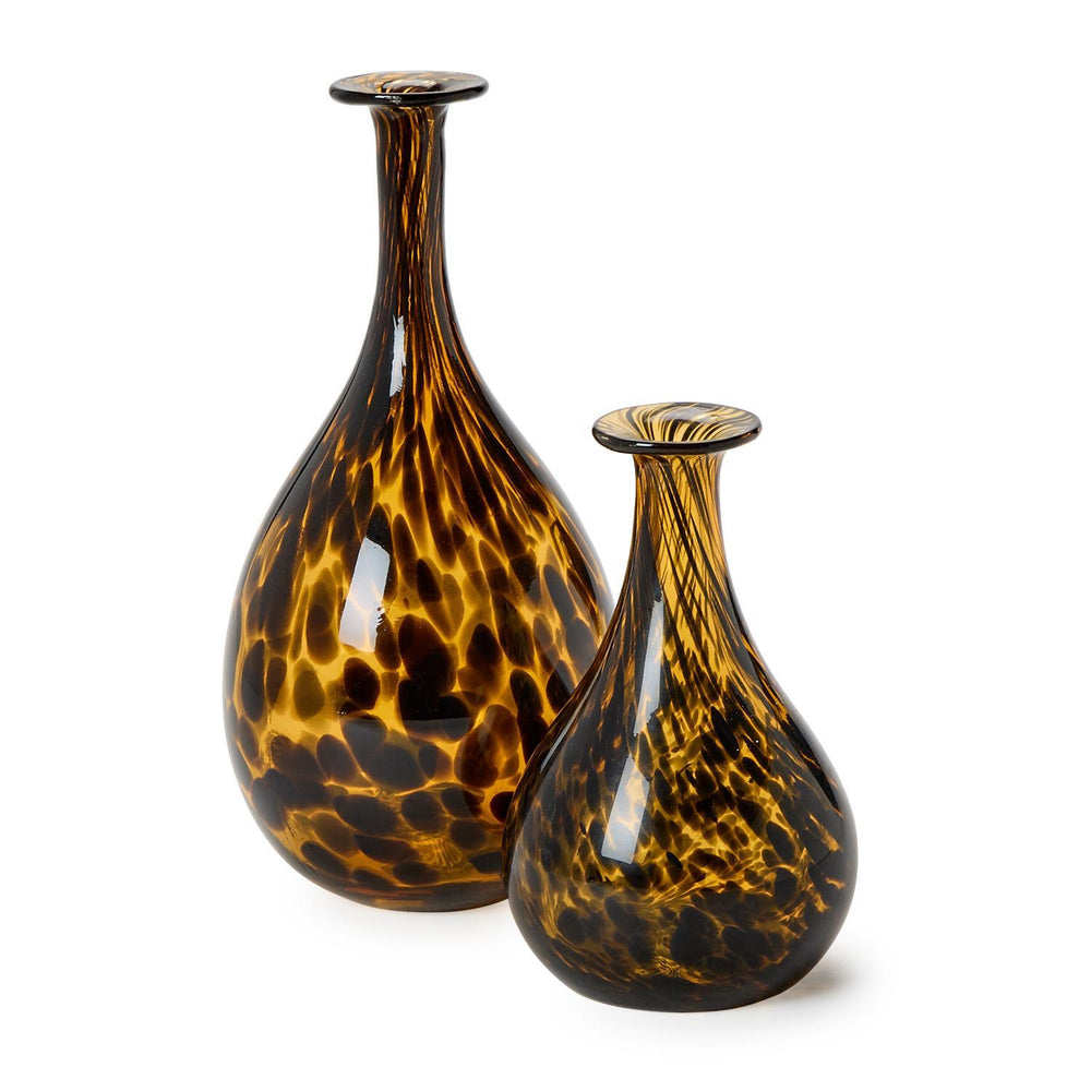Two tortoiseshell patterned vases on a white background