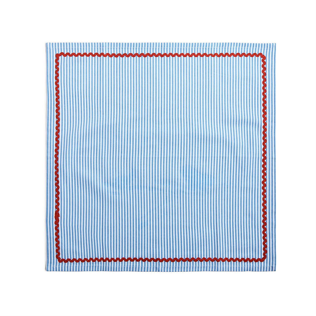 Blue striped fabric with red border on a white background