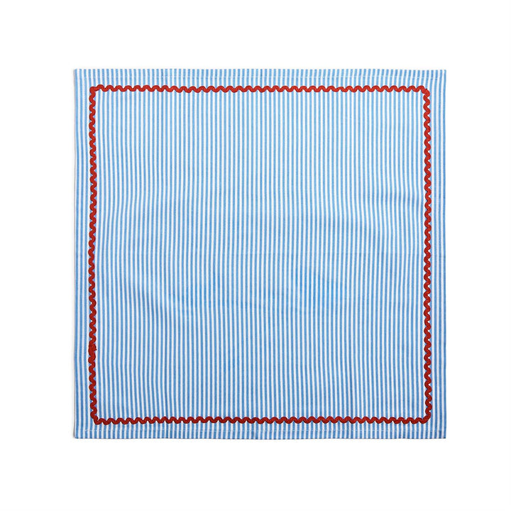 Blue striped fabric with red border on a white background