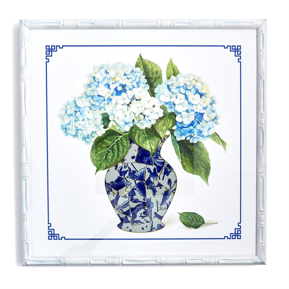 Decorative tray with a floral design featuring blue and white hydrangeas in a decorative vase.