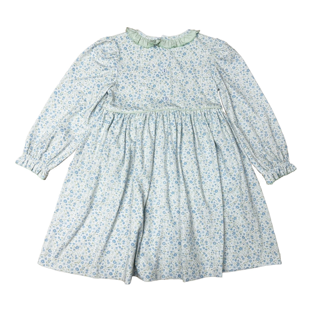 Floral dress with long sleeves on a white background