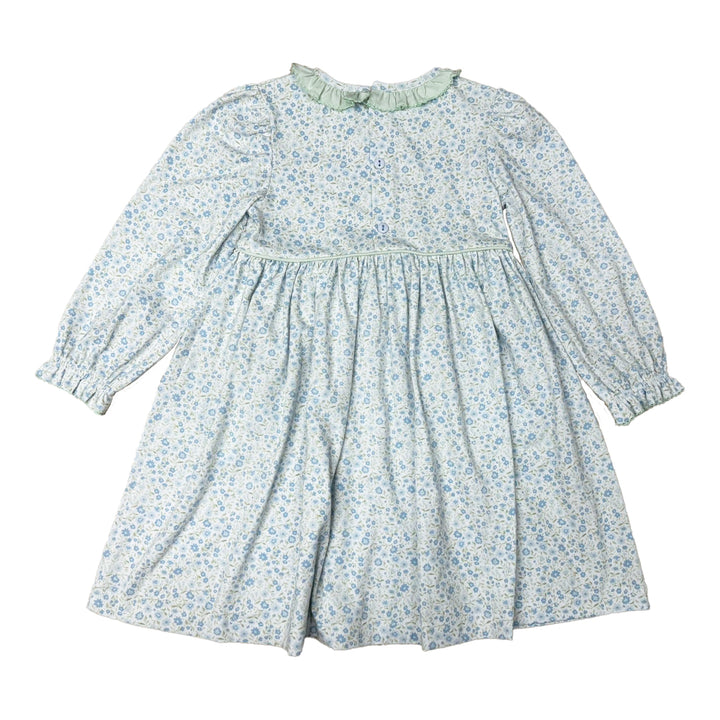 Floral dress with long sleeves on a white background