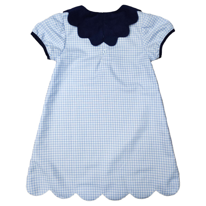blue check dress with navy trim sleeves and navy collar