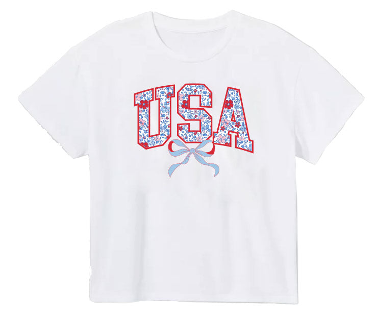 WHITE BOXY TEE SHIRT WITH FLORAL USA AND BOW ACROSS CHEST