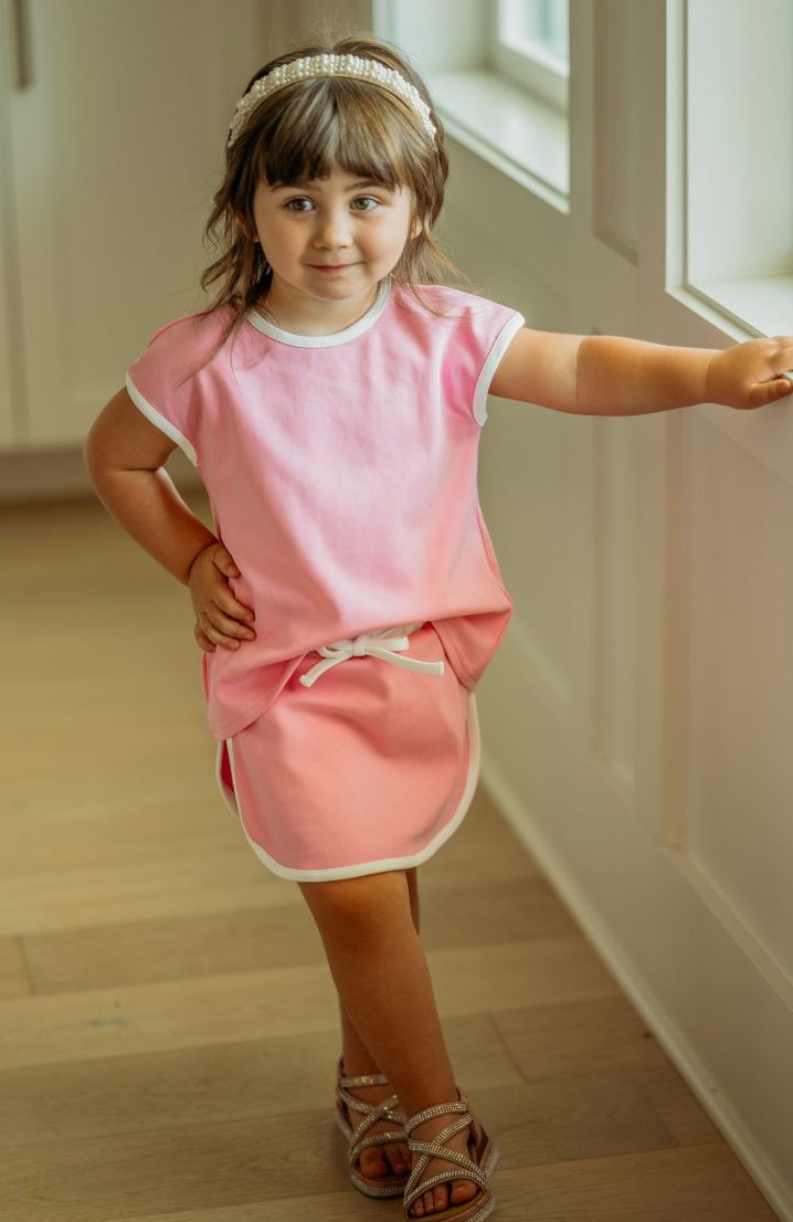 PINK AND WHITE SKORT SET ON LITTLE GIRL