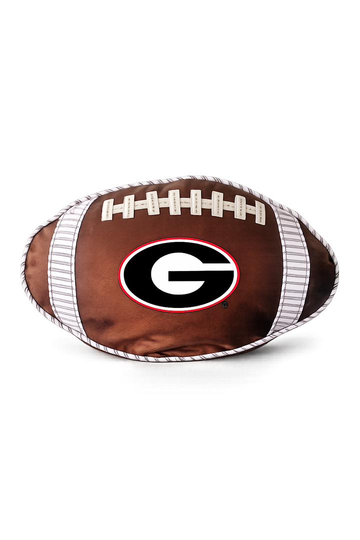 Georgia Bulldogs football-shaped plush pillow with the iconic black and red "G" logo. | Walker Boutique