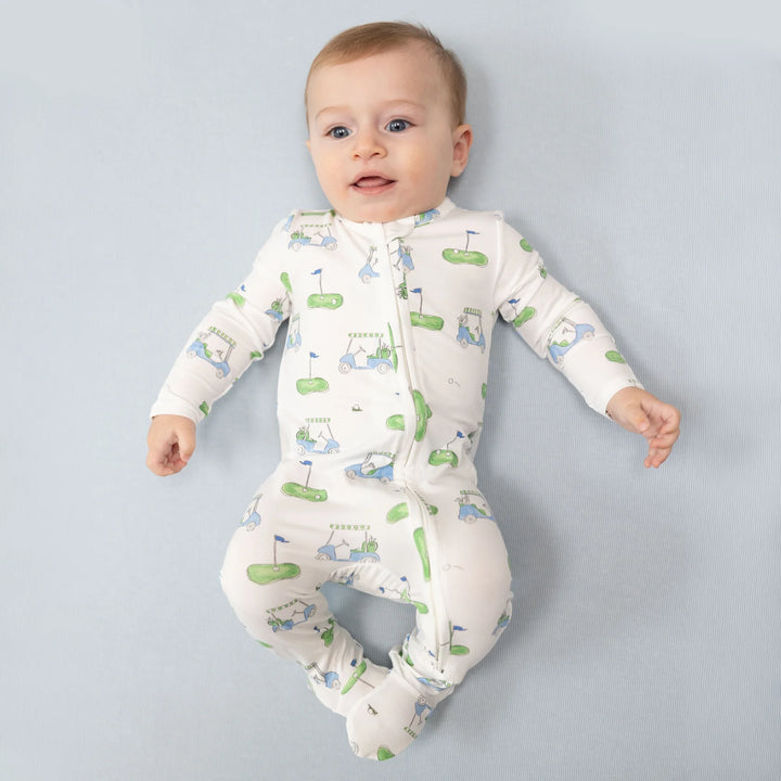 Angel Dear Golf Carts Blue 2-way Zipper Footie worn by a baby in a lifestyle view highlighting the golf carts blue 2-way design