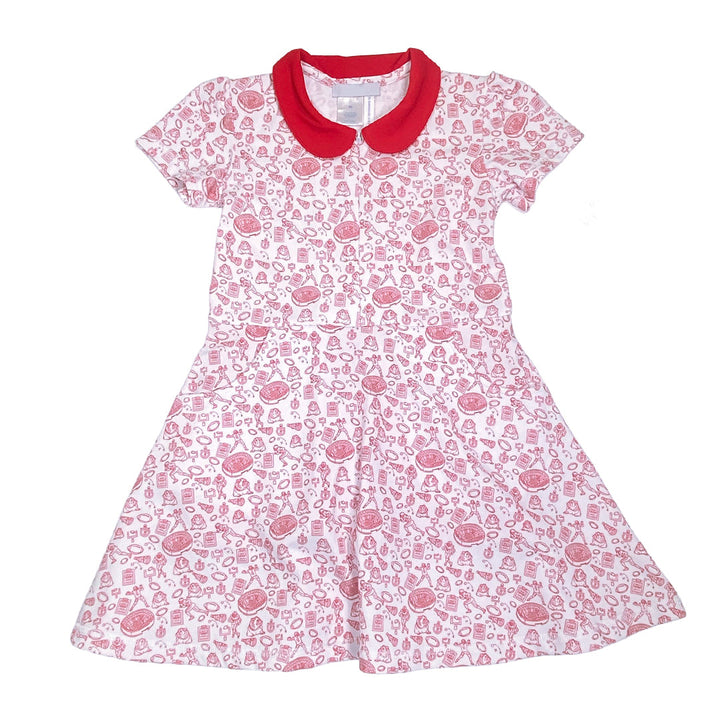 Children's dress with pink pattern and red collar on a white background