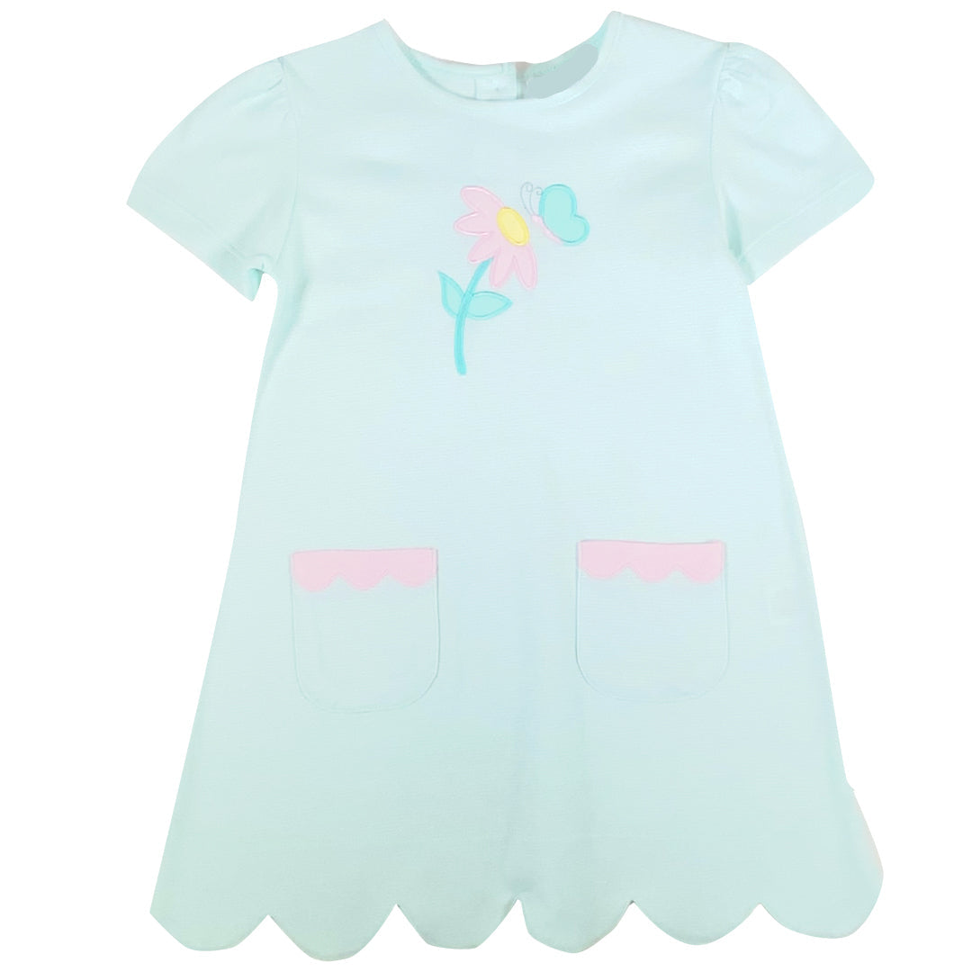 Light blue dress with a flower design on a white background