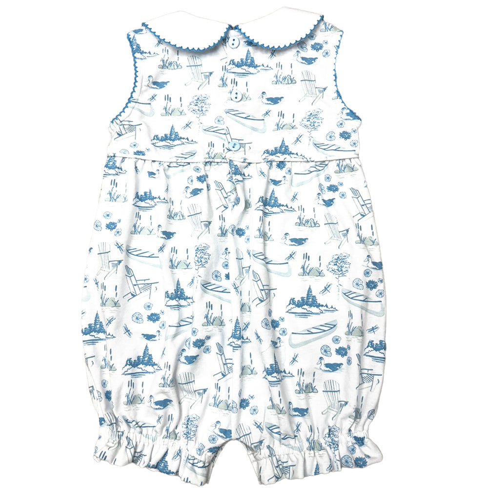 White romper with blue lake pattern on a white background
