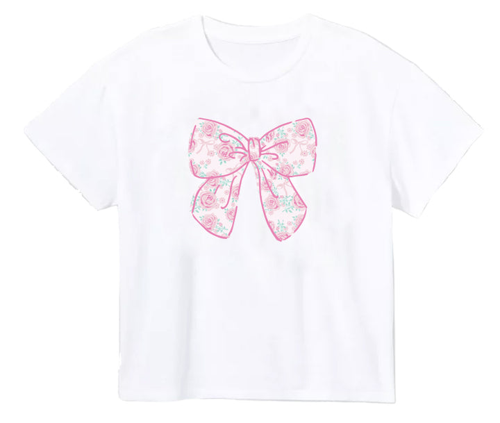 WHITE BOXY TSHIRT WITH PINK FLORAL BOW IN MIDDLE