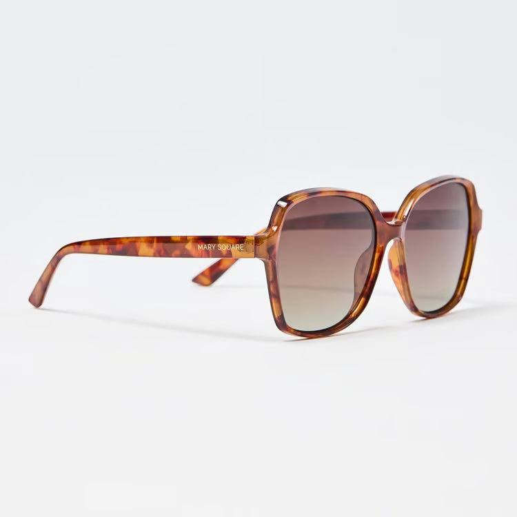 Mary Jane sunglasses with a brown and amber tortoiseshell acetate frame and gradient brown lenses, shown on a clean white background.