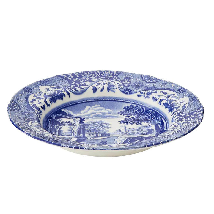 Blue and white patterned ceramic dish on a white background