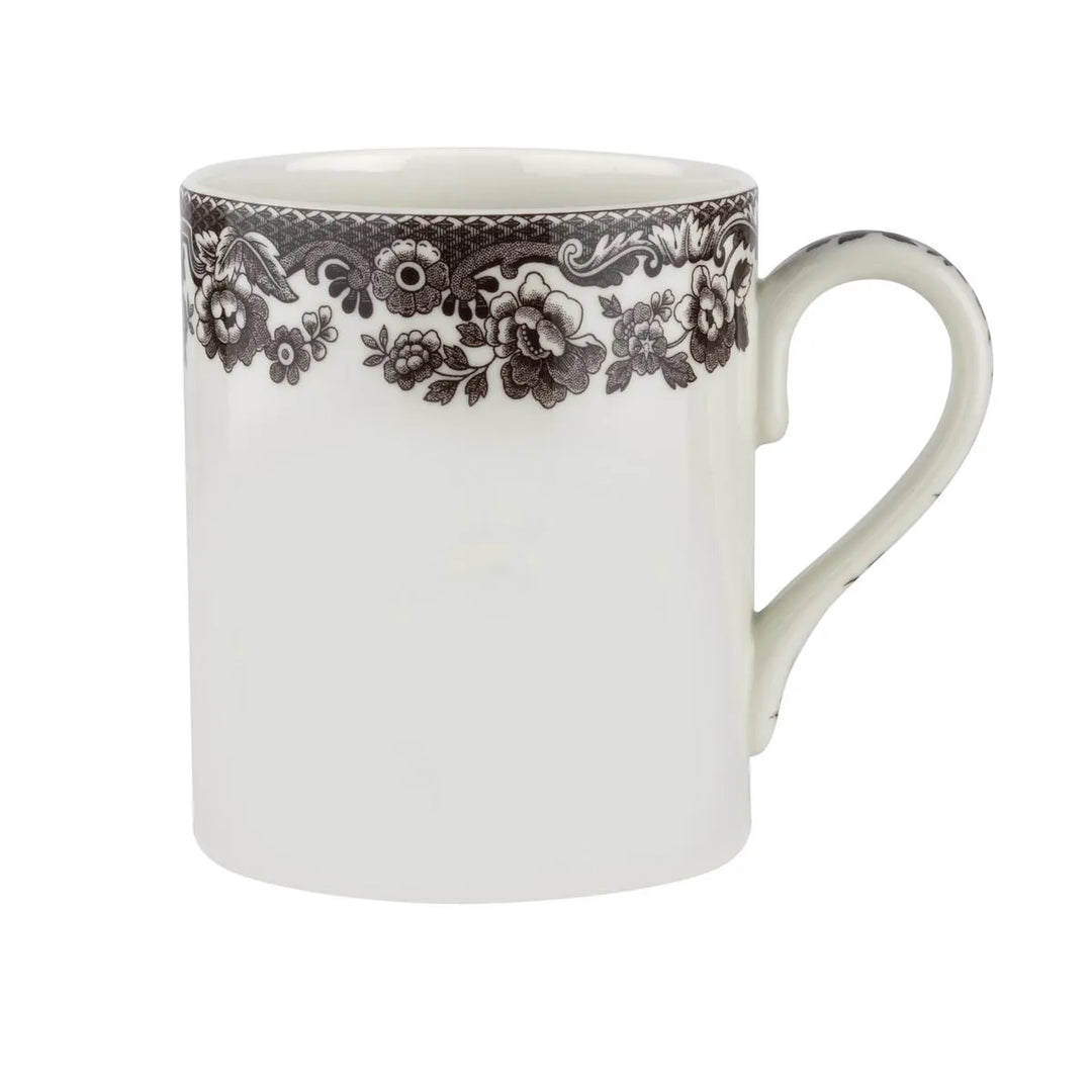 White mug with floral pattern on a white background