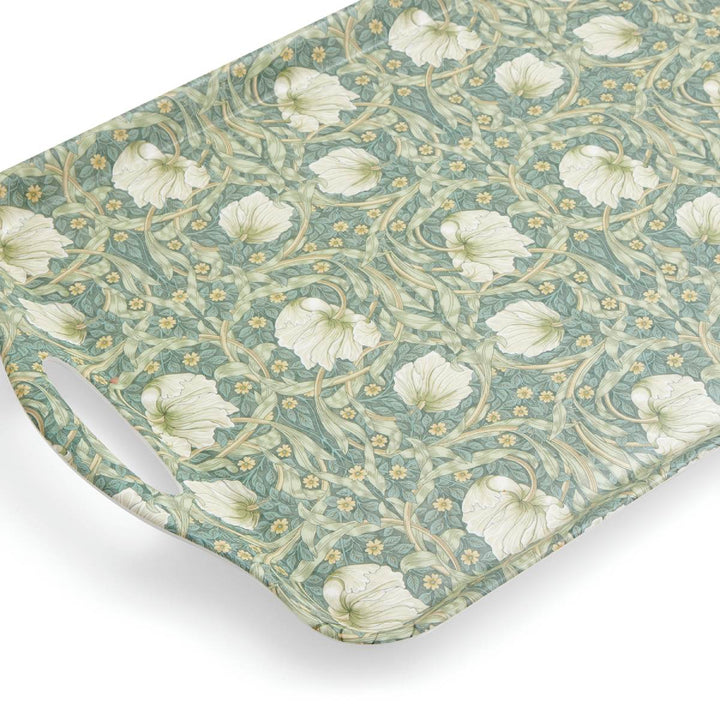 Floral patterned tray with white flowers on a teal background