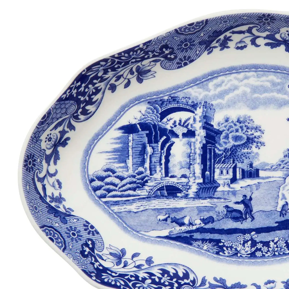 Blue and white ceramic plate with classical landscape design