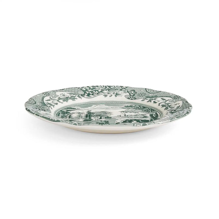 Decorative plate with green floral pattern on a white background