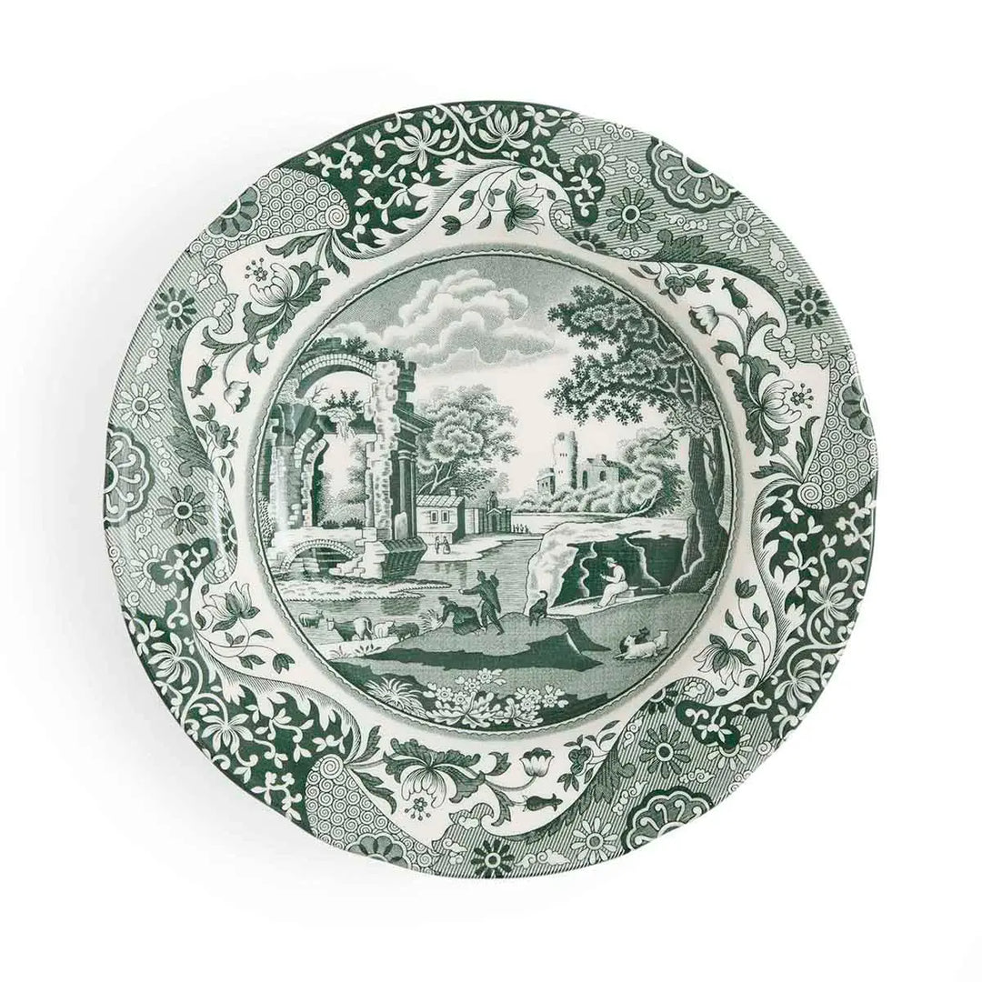Decorative plate with green and white pattern on a white background