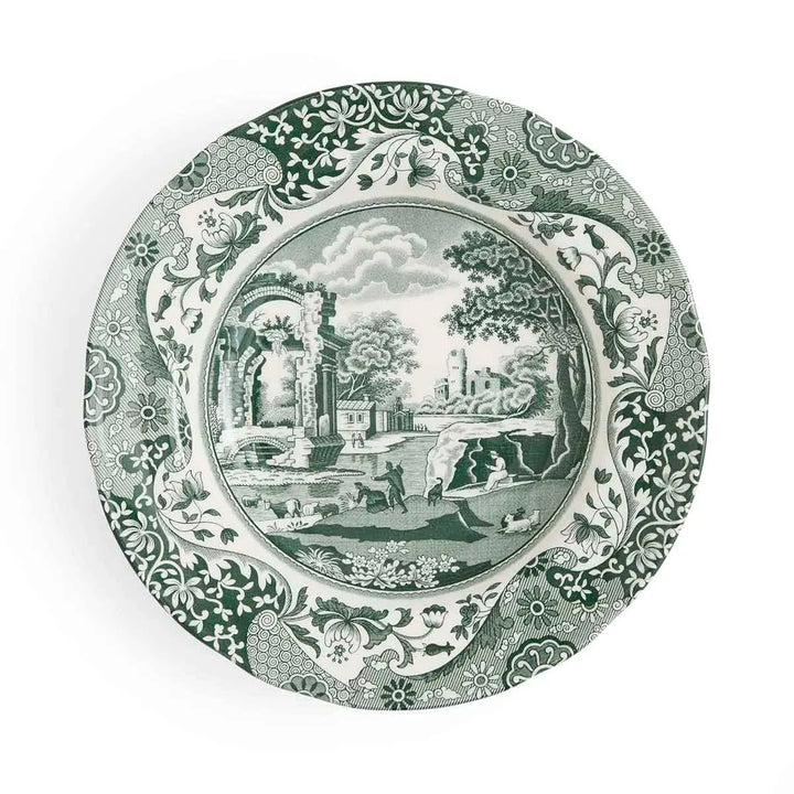 Decorative plate with green and white pattern on a white background