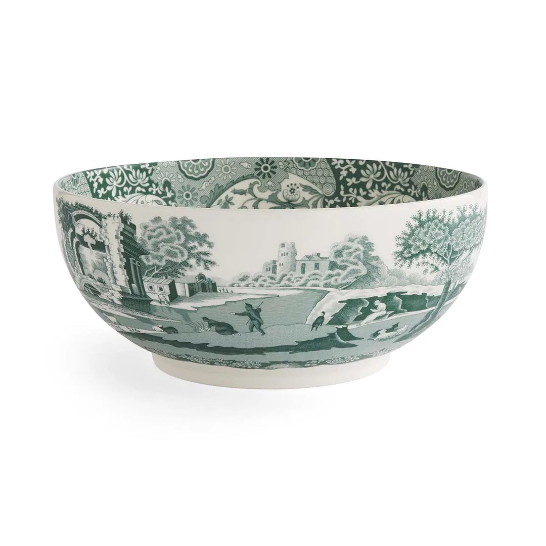 Decorative ceramic bowl with green and white pattern on a white background