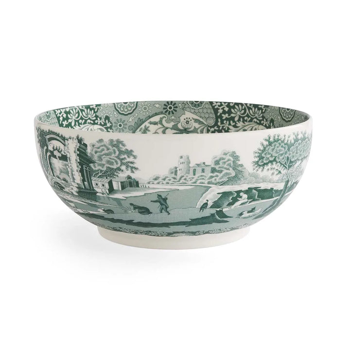 Decorative ceramic bowl with green and white pattern on a white background