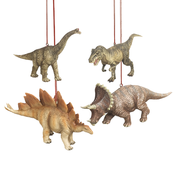 Four dinosaur figurines hanging from red strings on a white background