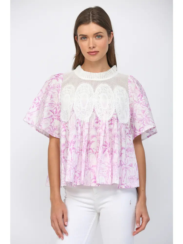 Woman wearing delicate floral appliqué details create a romantic and feminine silhouette.
Lightweight mesh fabric ensures breathability, making it ideal for layering or wearing solo. On white background