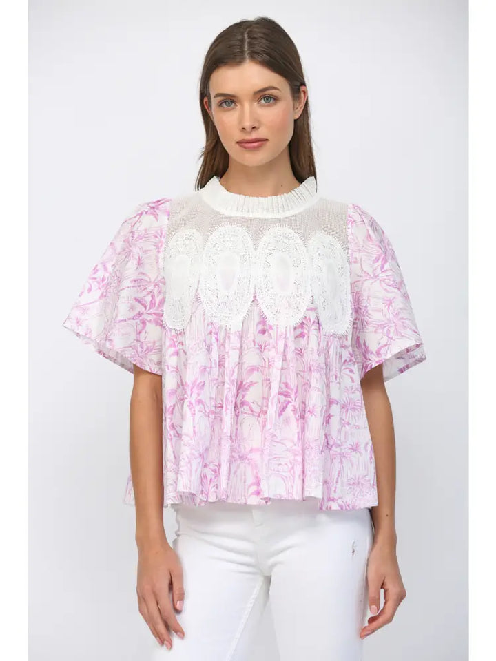 Woman wearing delicate floral appliqué details create a romantic and feminine silhouette.
Lightweight mesh fabric ensures breathability, making it ideal for layering or wearing solo. On white background