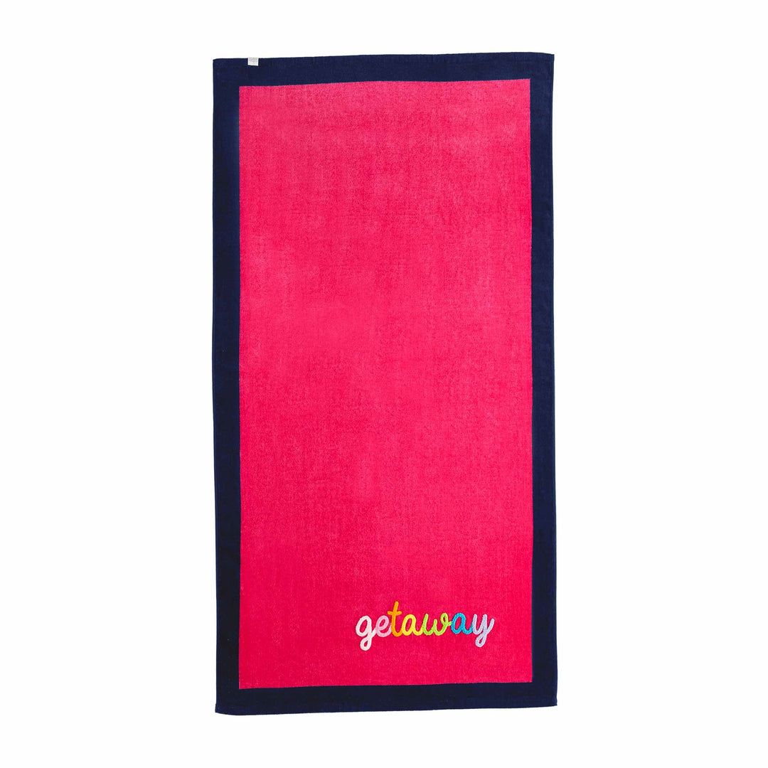 PINK TOWEL WITH NAVY BORDER. GETAWAY EMBROIDERED IN RAINBOW COLORS