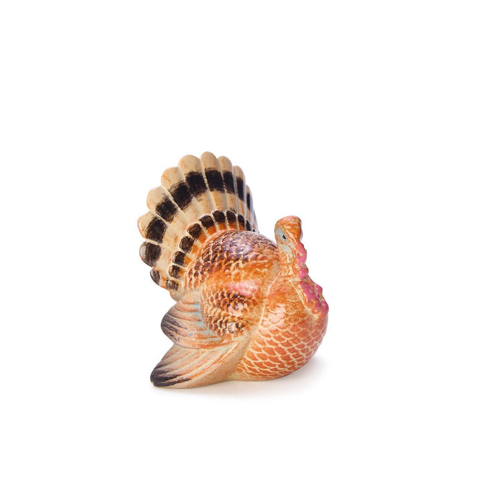 Decorative figurine of a turkey on a white background