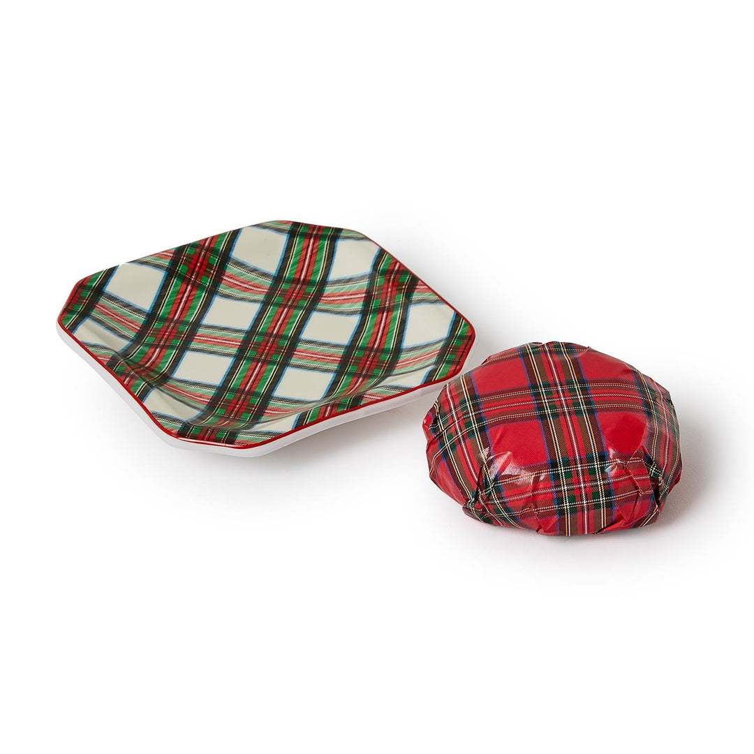 Two plaid-patterned ceramic dishes on a white background
