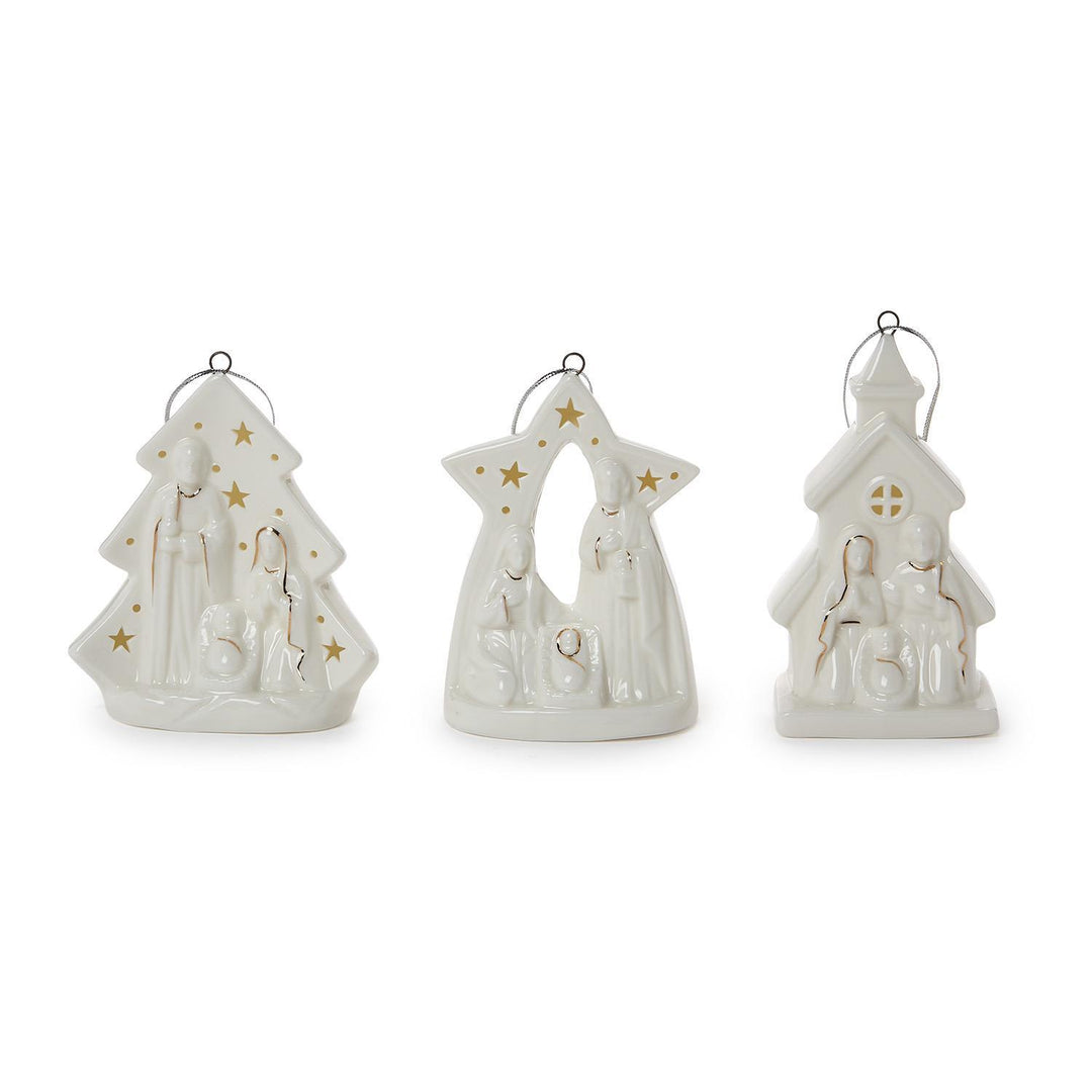 Set of three white nativity scene figurines on a white background