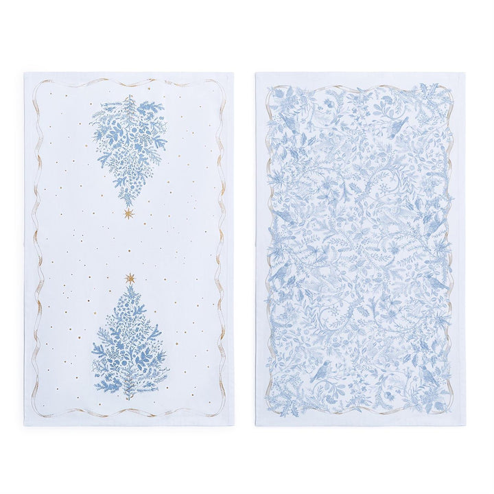 Two decorative paper sheets with Christmas tree designs on a white background