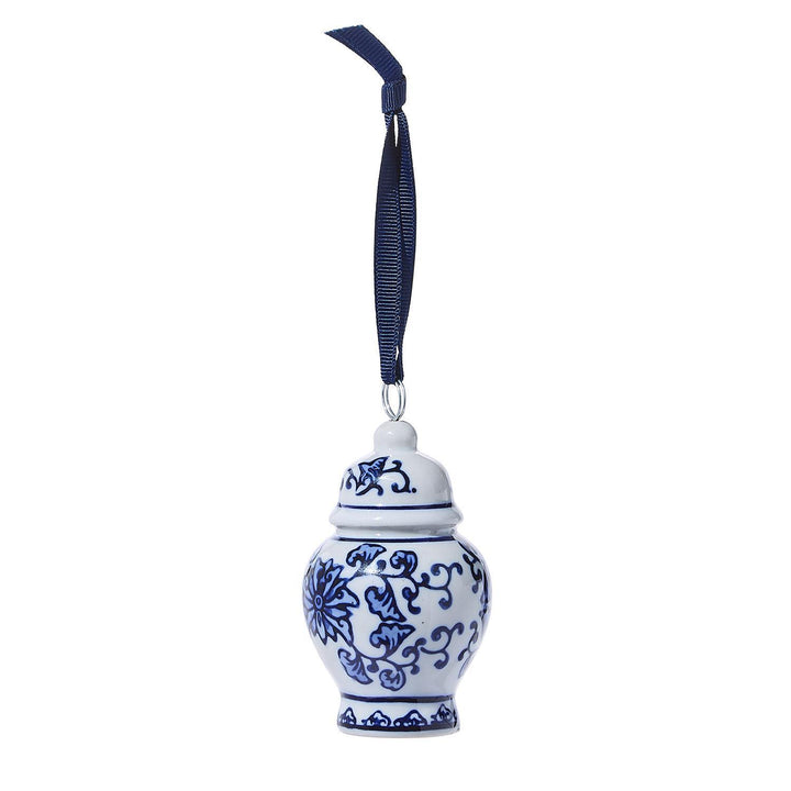 Blue and white decorative vase ornament with floral patterns on a white background