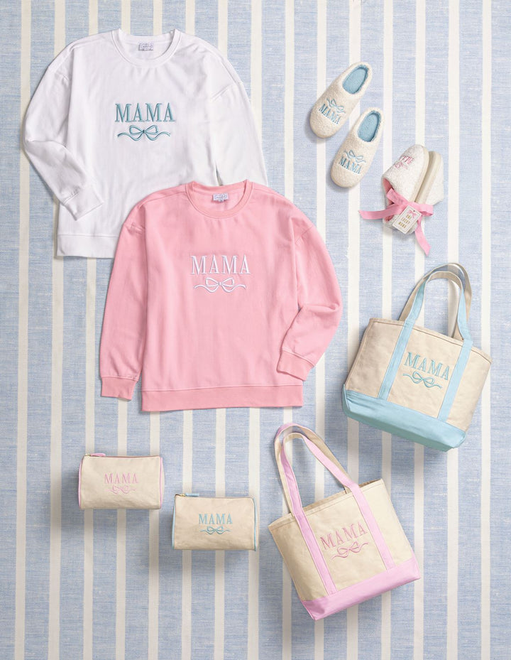 Collection of 'MAMA' themed clothing and accessories on a striped background