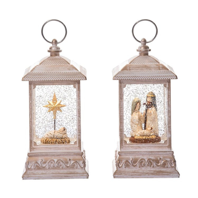 Two decorative lanterns with Christmas scenes inside on a white background