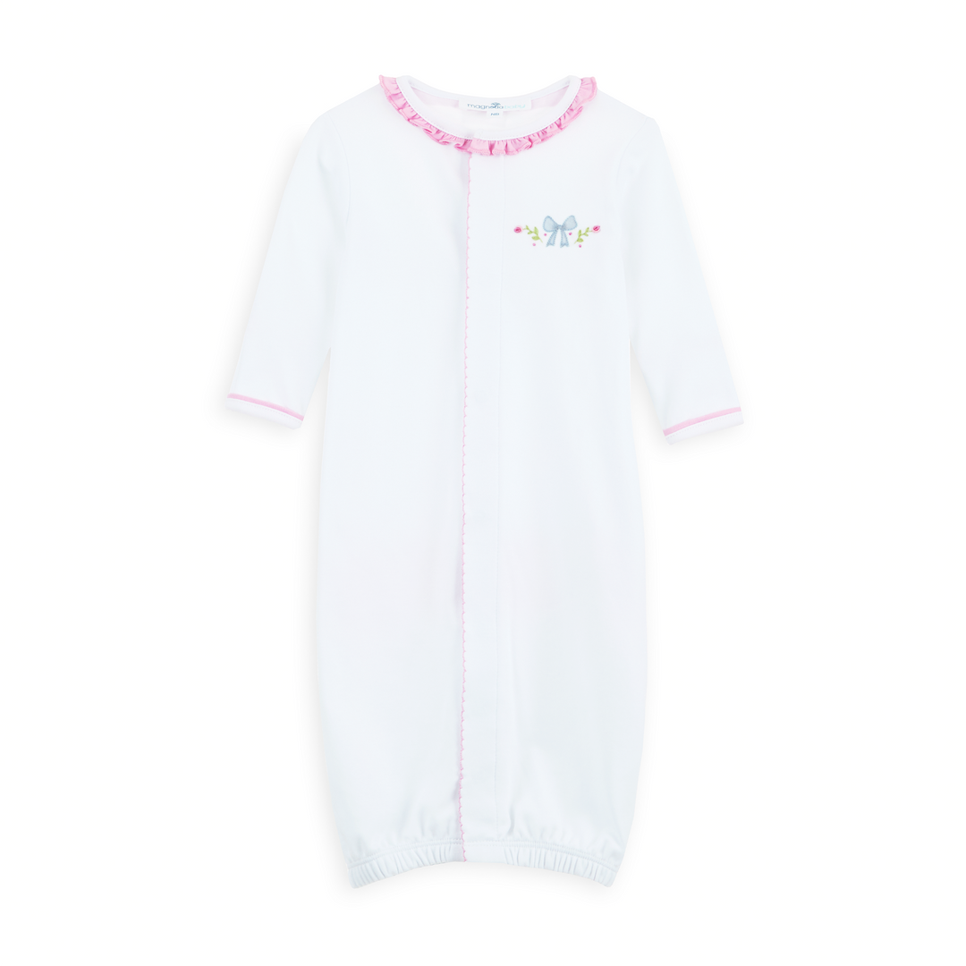 WHITE CONVERTER GOWN WITH PINK RUFFLE TRIM DETAIL AND BOW WITH FLORAL EMBROIDERY 