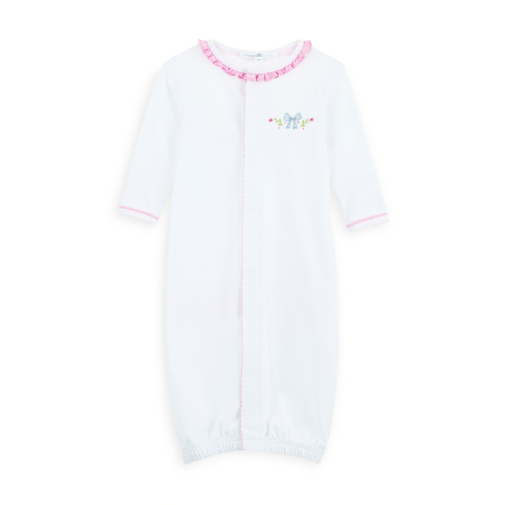 WHITE CONVERTER GOWN WITH PINK RUFFLE TRIM DETAIL AND BOW WITH FLORAL EMBROIDERY 