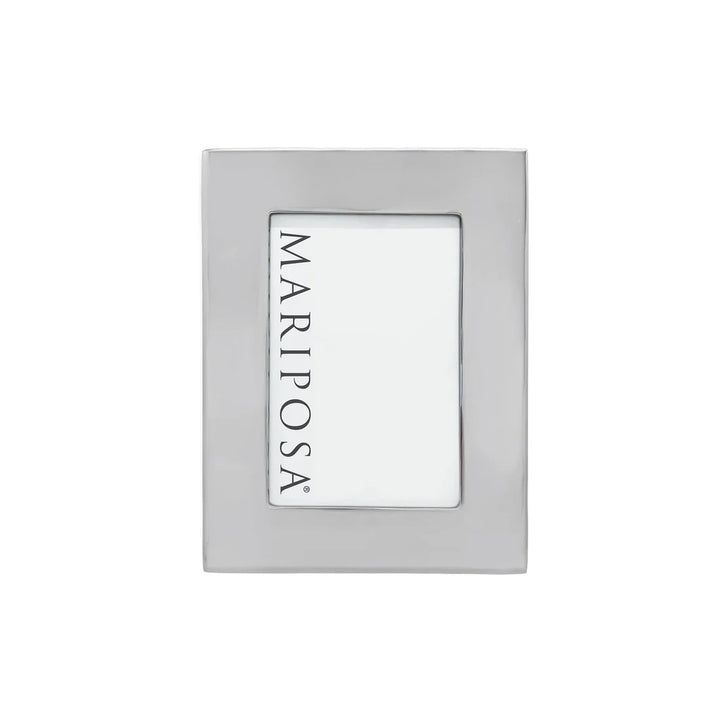 A square silver-toned metal frame with a clear center panel displaying the vertical brand name 'MARIPOSA' in black text, shown on a plain white background.