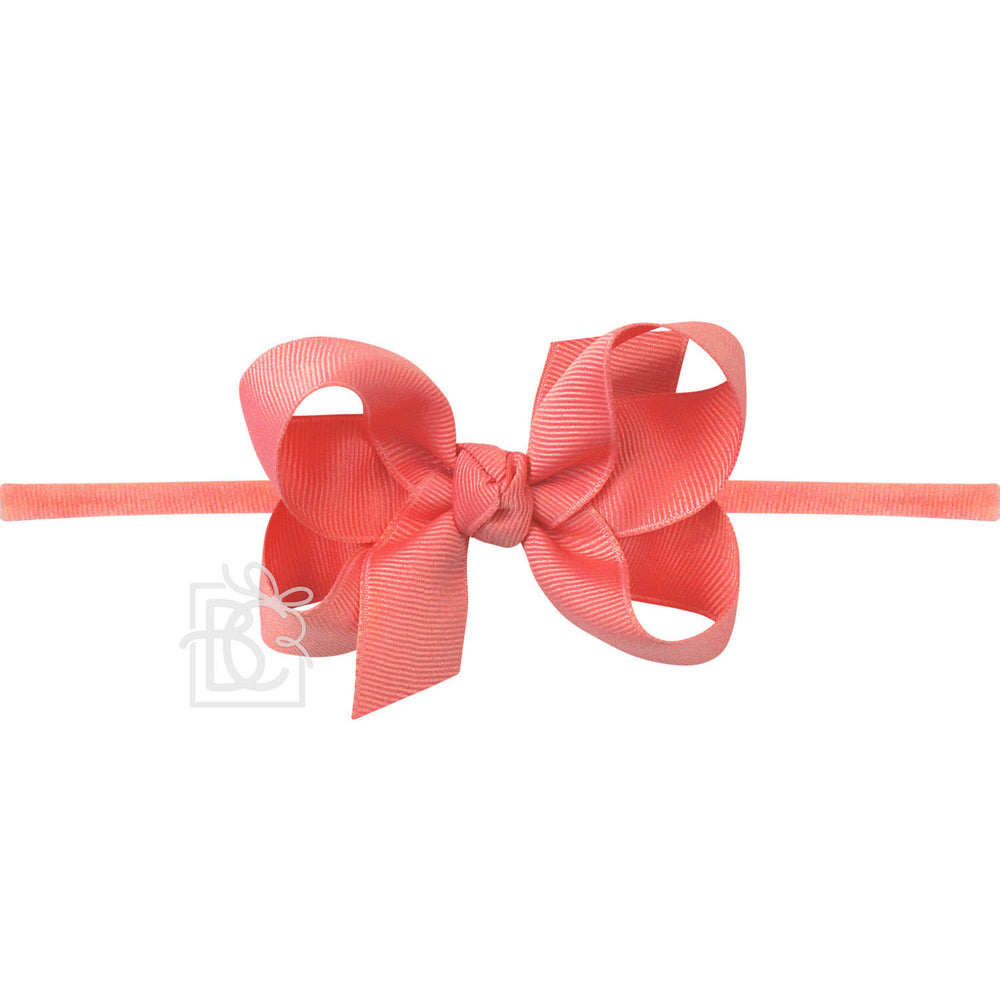 Watermelon bow hair clip on a white background
