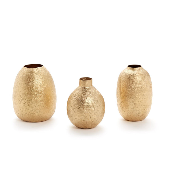 Three gold textured vases of different sizes on a white background