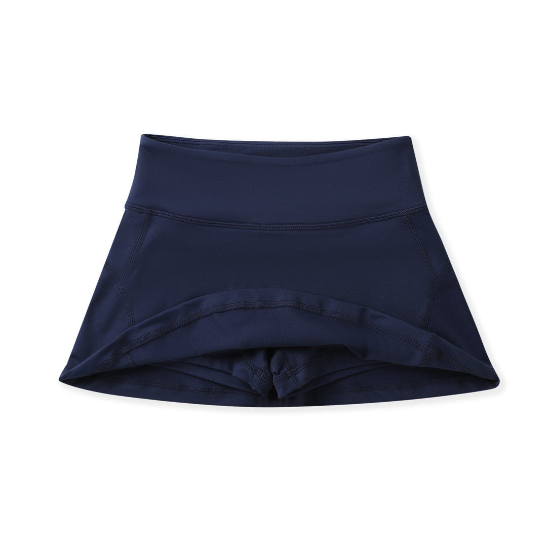 A dark navy blue high-waisted athletic skirt, folded to show the waistband and layered front design, photographed on a clean white background.