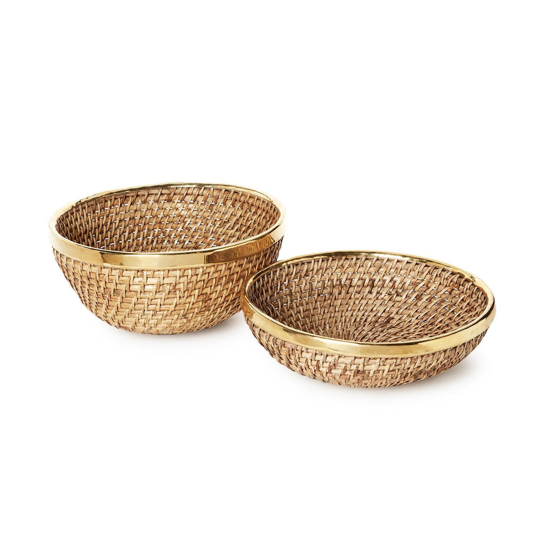 Two woven baskets with gold rims on a white background