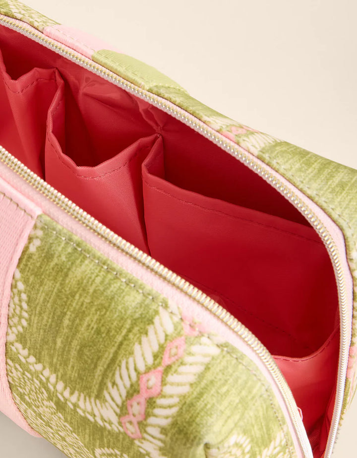 Green and pink cosmetic bag with red interior
