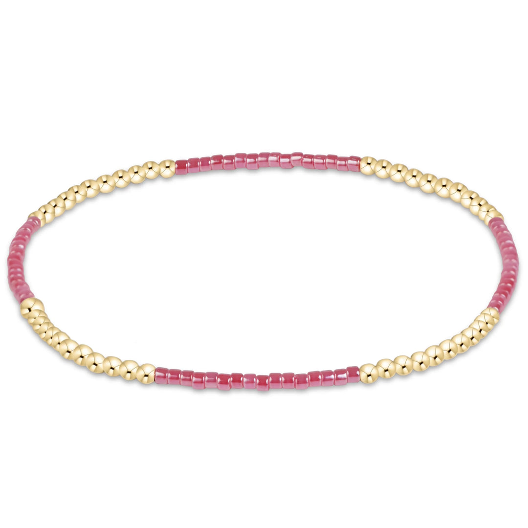 PINK AND GOLD BEADED BRACELET