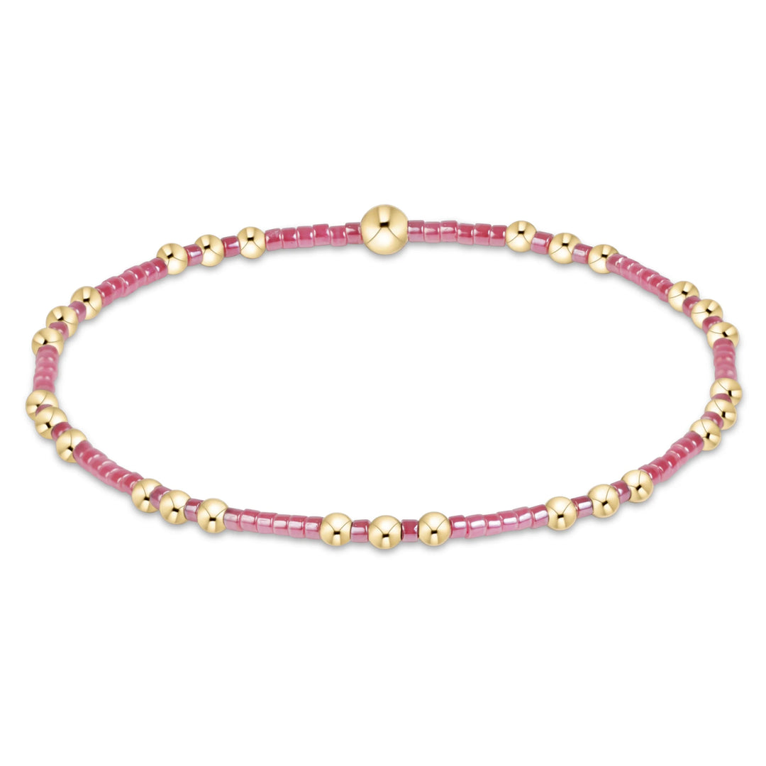 pink and gold beaded bracelet