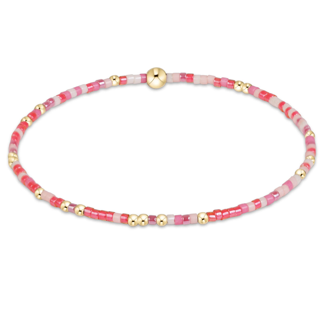 MULTI  PINK COLOR BEADED BRACELETS ON WHITE BACKGROUND