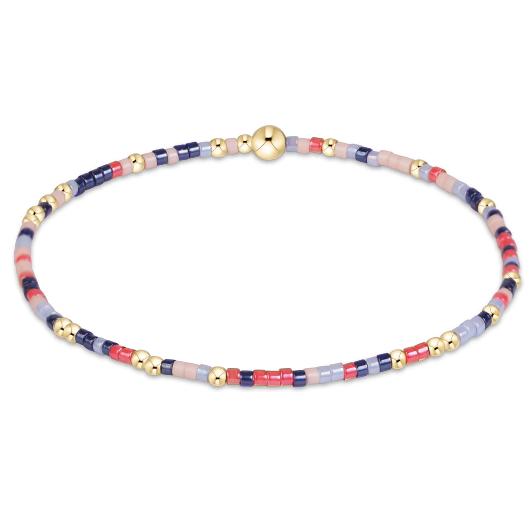 various colors of randomly mixed 2mm seed beads and 2mm, 14k gold-filled beads